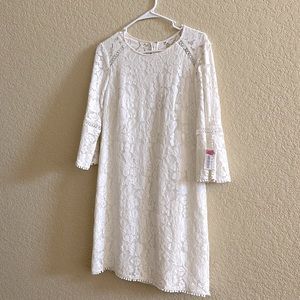 Vince Comuto ivory lace knee length dress from Dillards.